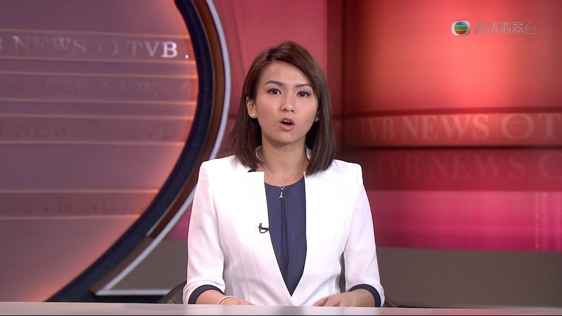 Asian news anchor