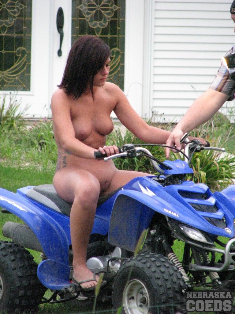wife rides atv naked